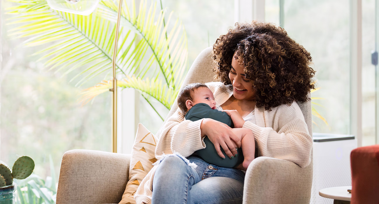 Young mom enjoys her time on maternity leave with her baby boy
