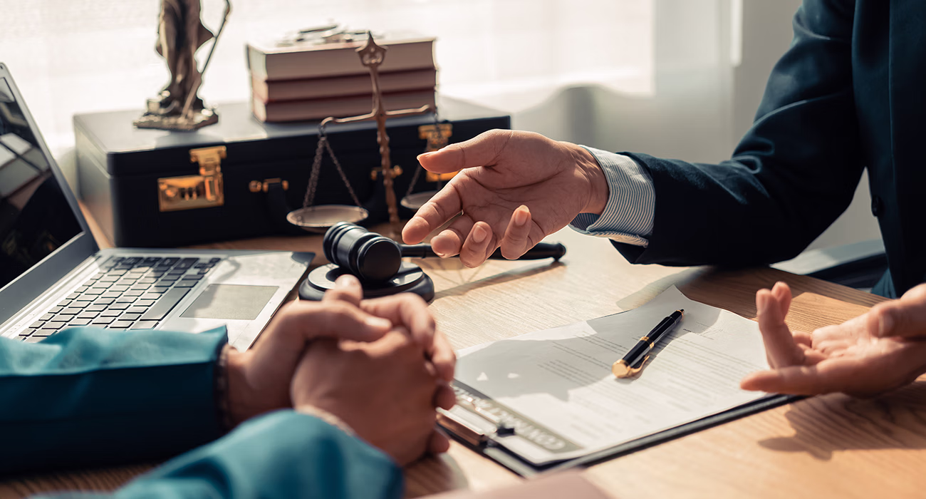 Professional lawyers and businessmen working and talking in law office